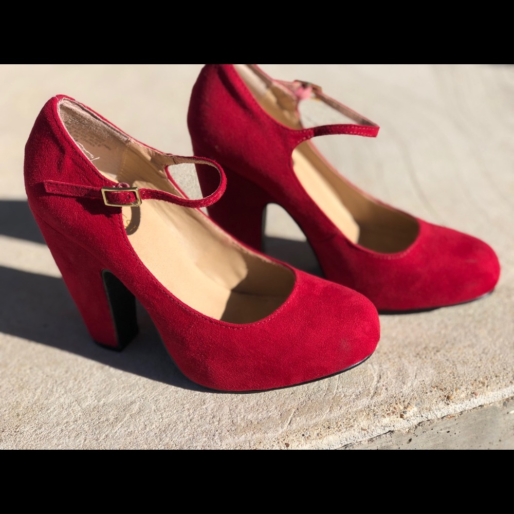 Red suede Mary Jane heels.